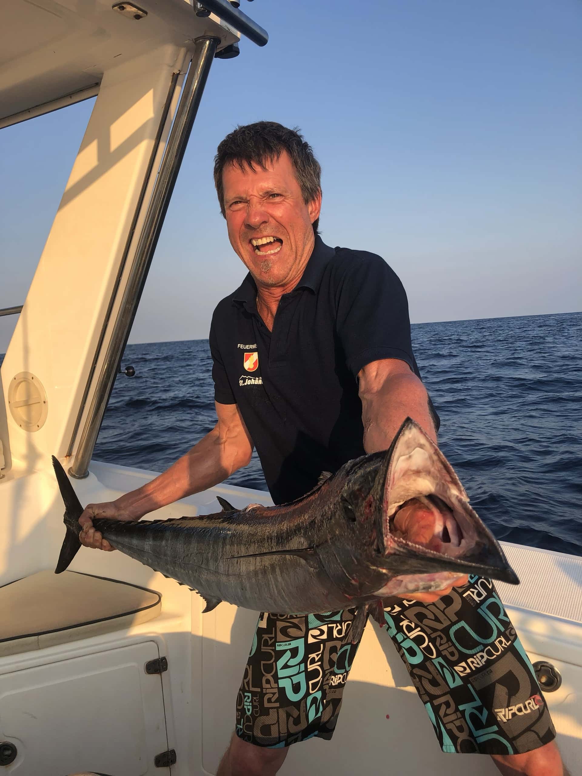 A wahoo brought over the rail on the boat off Mozambique